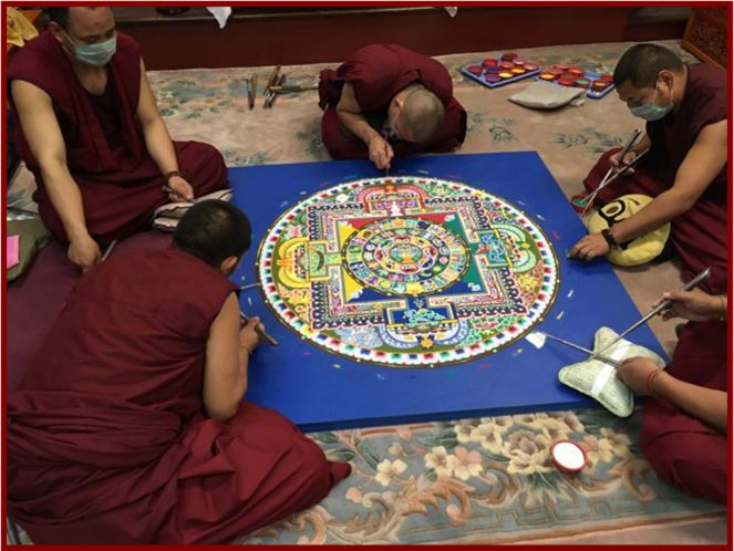 Tibetan Monks working on Sand Mandala